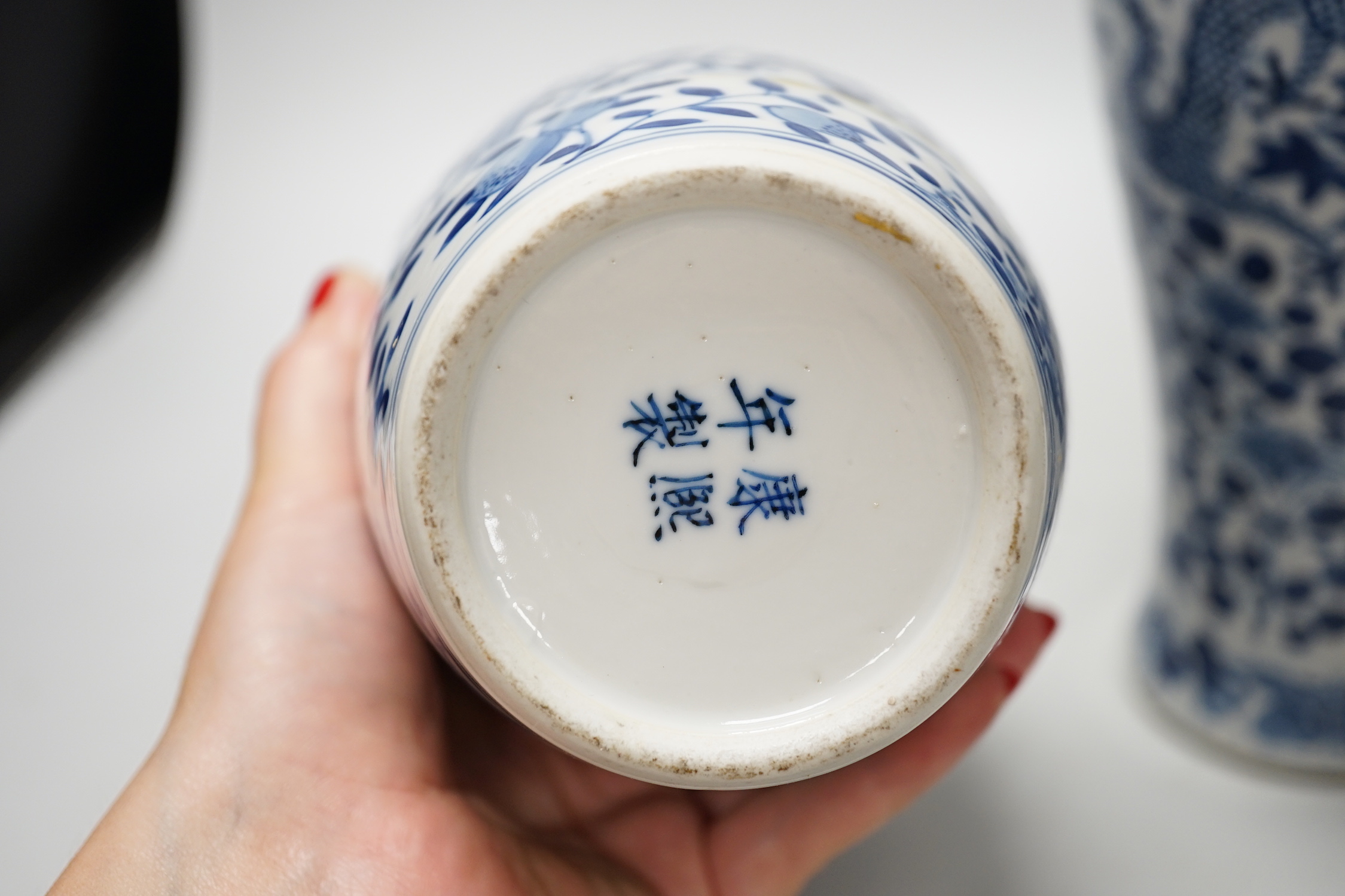 A Chinese blue and white ‘dragon’ vase and cover, and another, tallest 32cm; some damage
